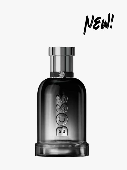 BOSS perfume bottle on a white background with 'NEW!' text.